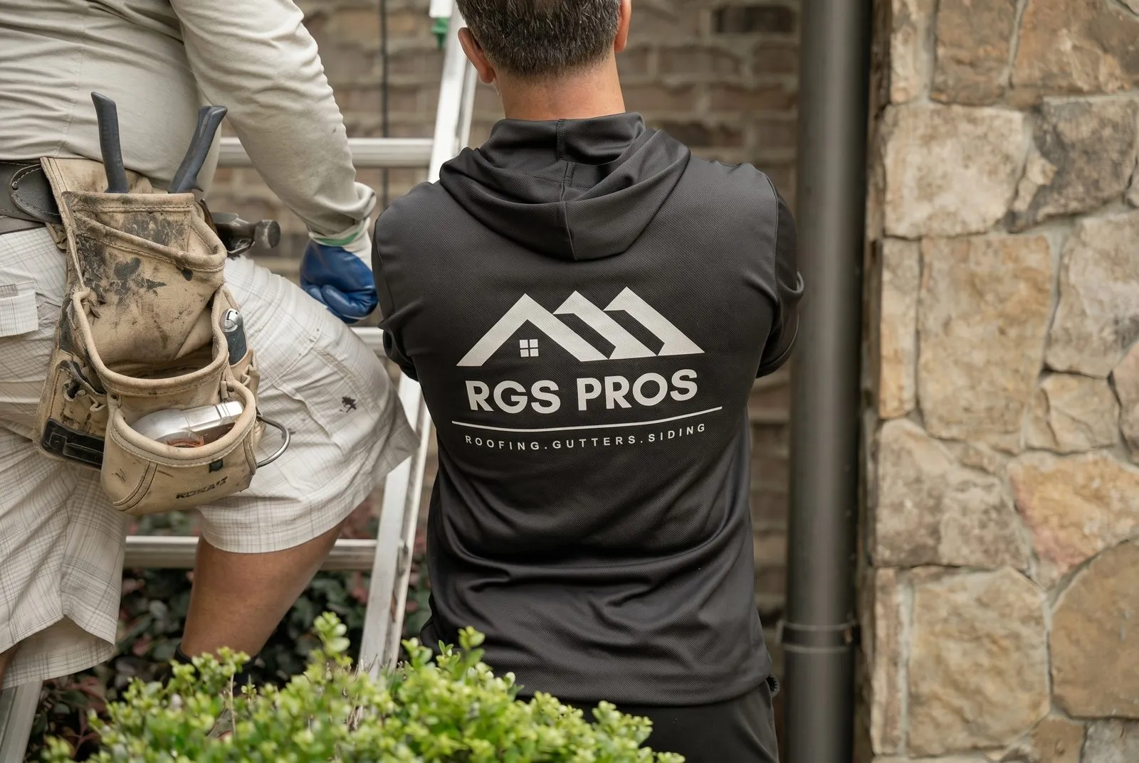 RGS Home Pros crew on the job — roofing, gutters, siding